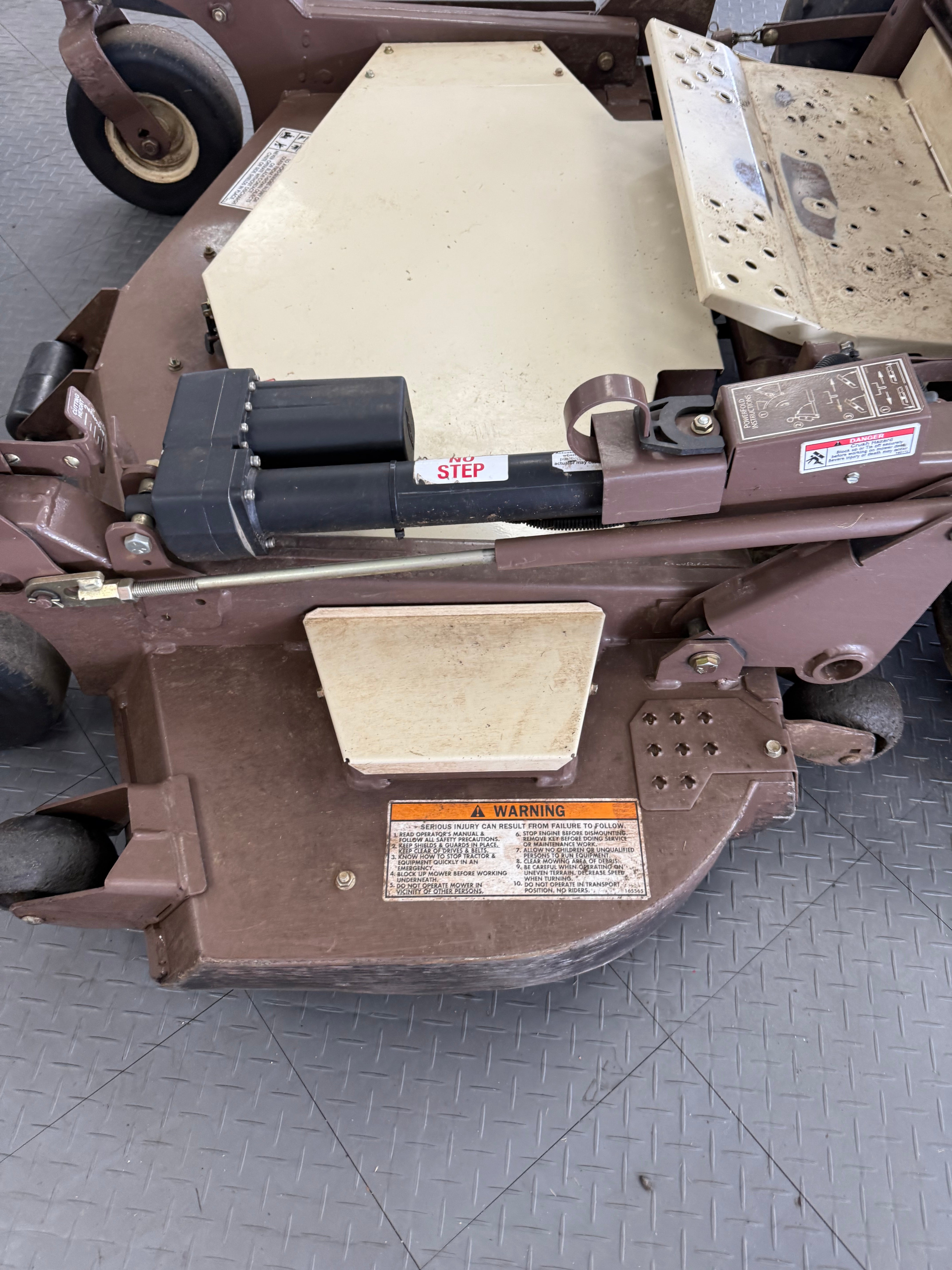 Close-up of a piece of industrial equipment on a tiled floor