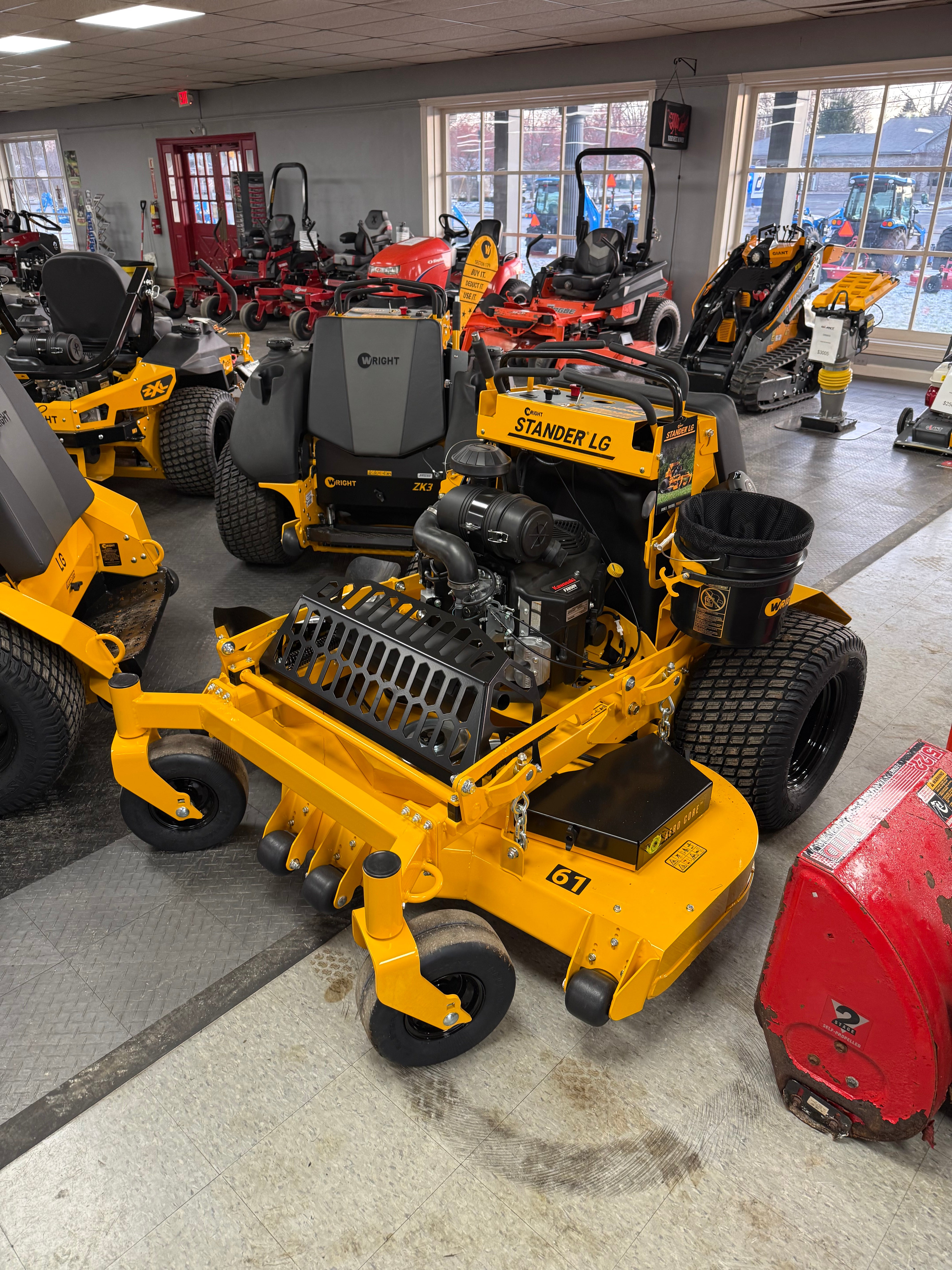 Yellow construction equipment in a workshop setting